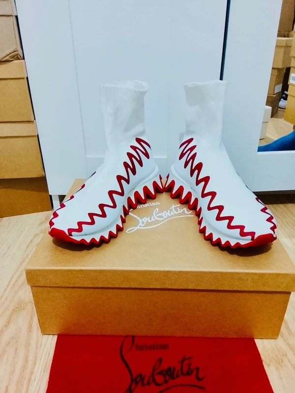 Magnifique Sneaker Christian Louboutin Modèle Shark Montante Blanche.